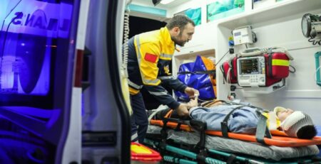First Aid to Young Man Accident in Ambulance