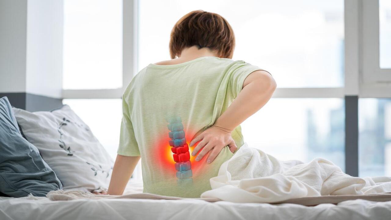 Woman Suffering from Herniated Disc