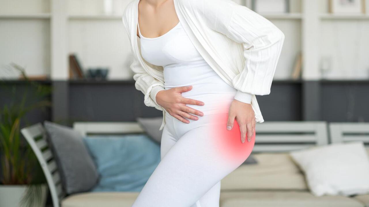 Woman Suffering from Bursitis on Her Hips
